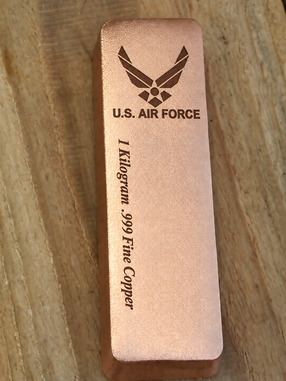 1 kilogram .999 fine copper Air Force bar in satin finish, front view, top emblem and lengthwise inscription