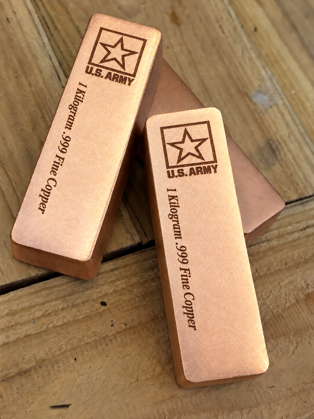1 kilogram .999 fine copper Army bar in satin finish, angled stacked view, top emblem and lengthwise inscription