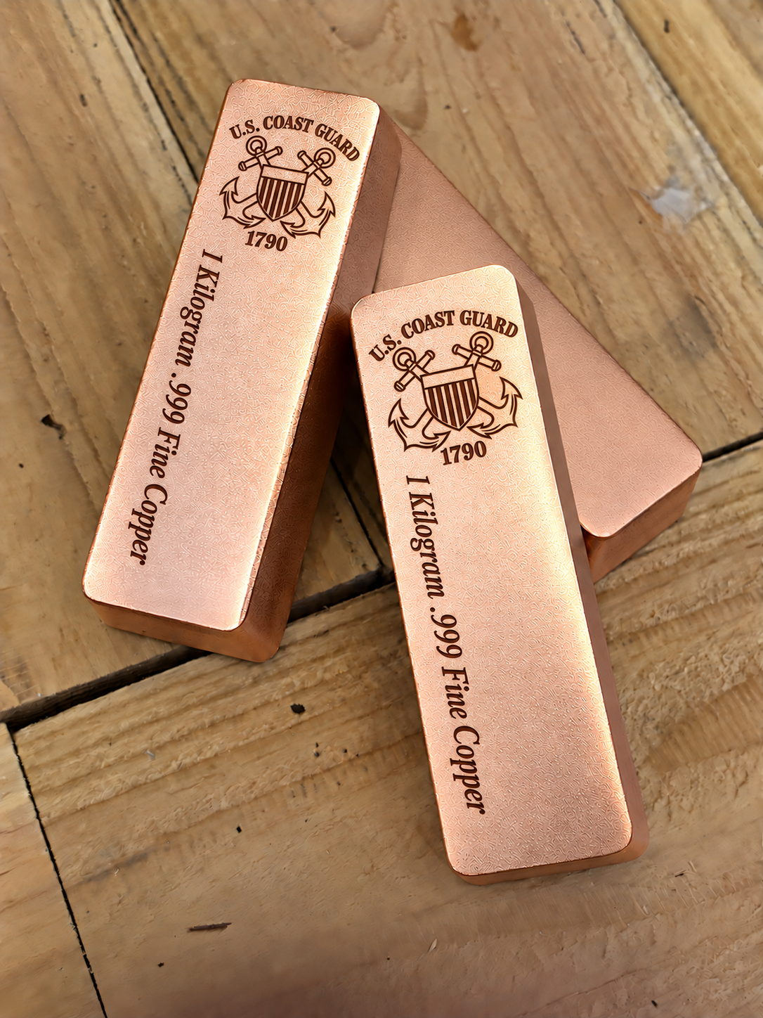 1 kilogram .999 fine copper Coast Guard bar in satin finish, stacked view, top emblem and lengthwise inscription