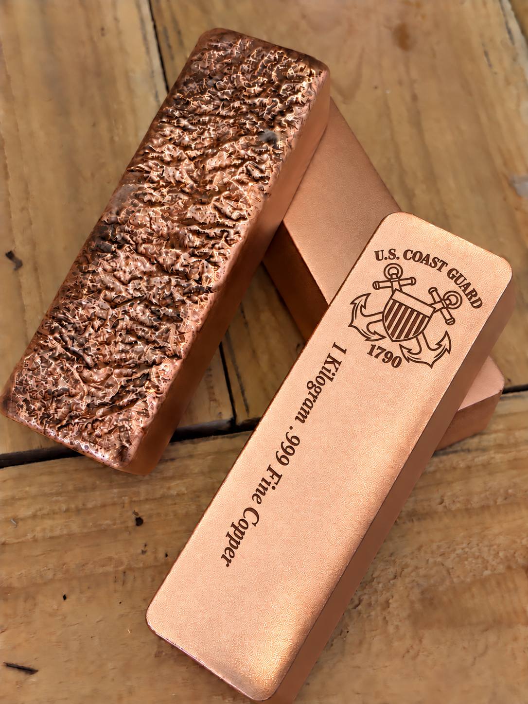 1 kilogram .999 fine copper Coast Guard bar in satin finish, front and rough cast reverse view, top emblem and lengthwise inscription