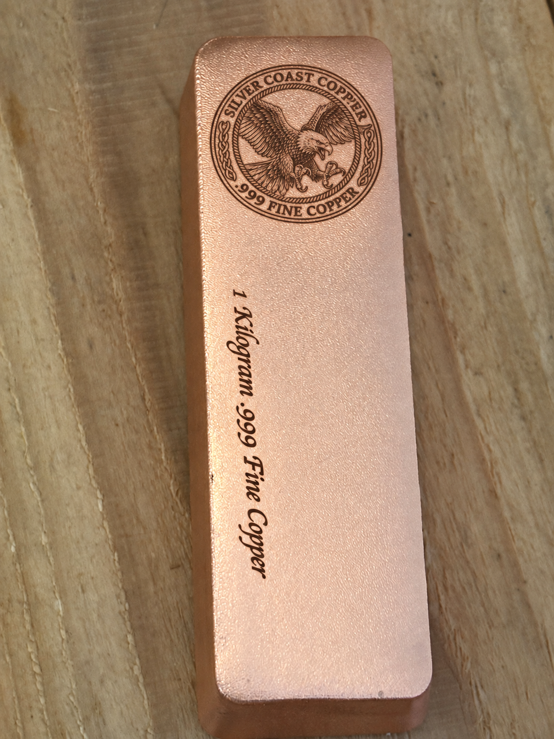 1 kilogram .999 fine copper eagle logo bar in satin finish - single bar with weight inscription