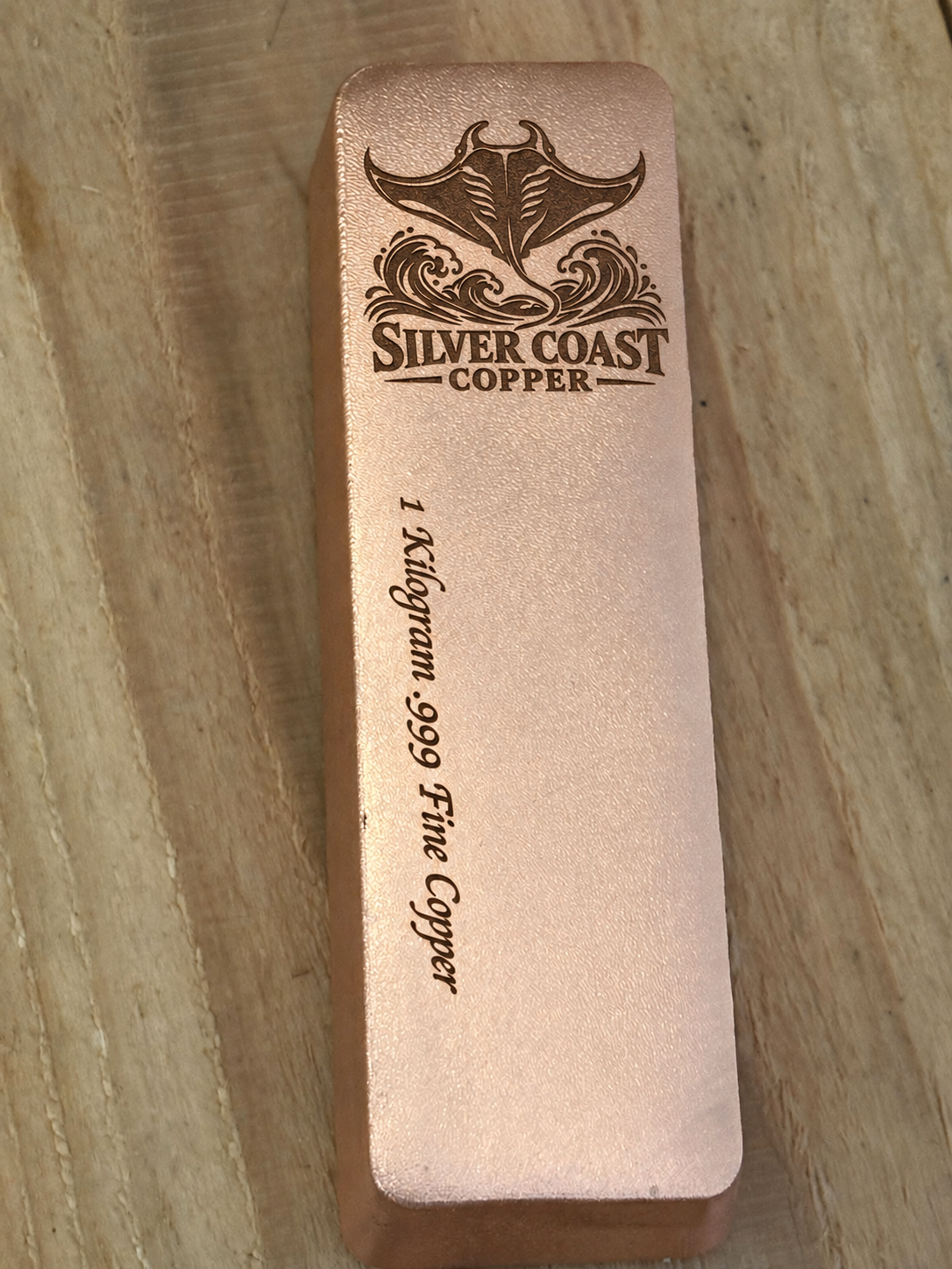 1 kilogram .999 fine copper manta ray logo bar in satin finish - single bar with weight inscription