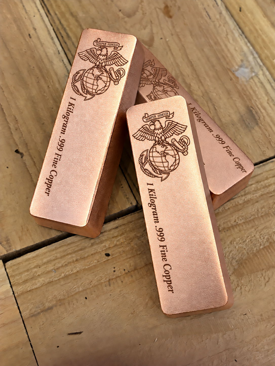 1 kilogram .999 fine copper Marine Corps bar in satin finish, stacked view, top emblem and lengthwise inscription