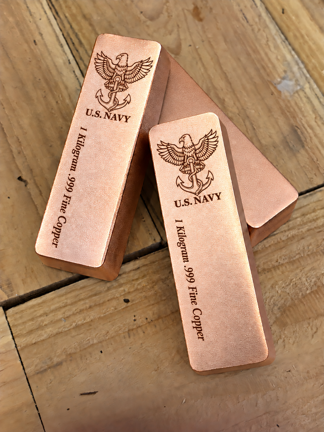 1 kilogram .999 fine copper Navy bar in satin finish, stacked view, top emblem and lengthwise inscription