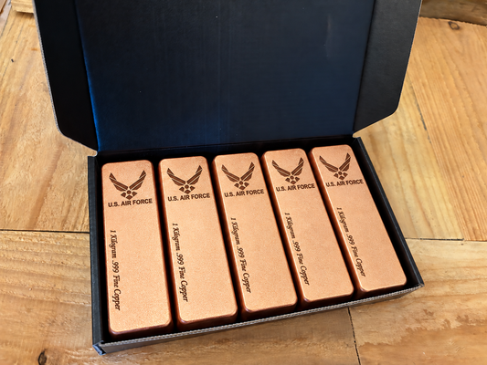 Air Force five-pack: five 1 kilogram .999 fine copper bars in satin finish, displayed in an open black presentation box