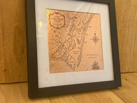 Engraved copper map of the Cape Fear coastline in a black frame with a white mat