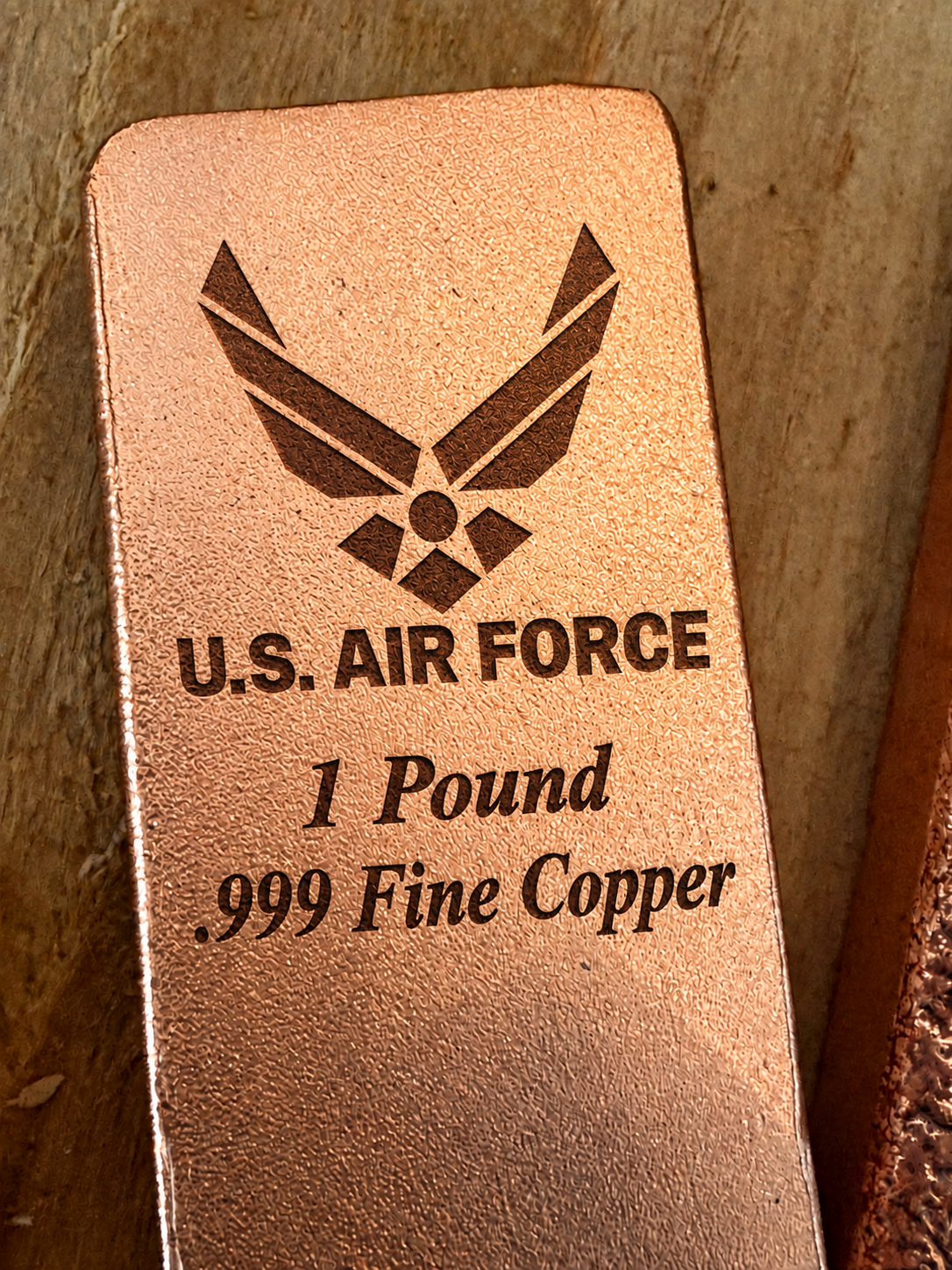 Air Force 1 Pound .999 Fine Copper bar engraving mockup, close-up