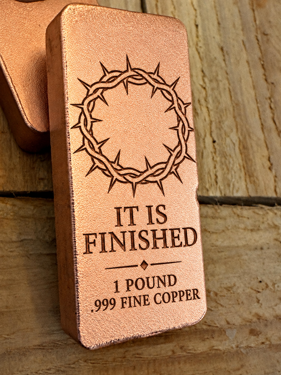 Crown of Thorns and "It Is Finished" engraved on a 1 pound .999 fine copper satin bar, angled view (design preview)