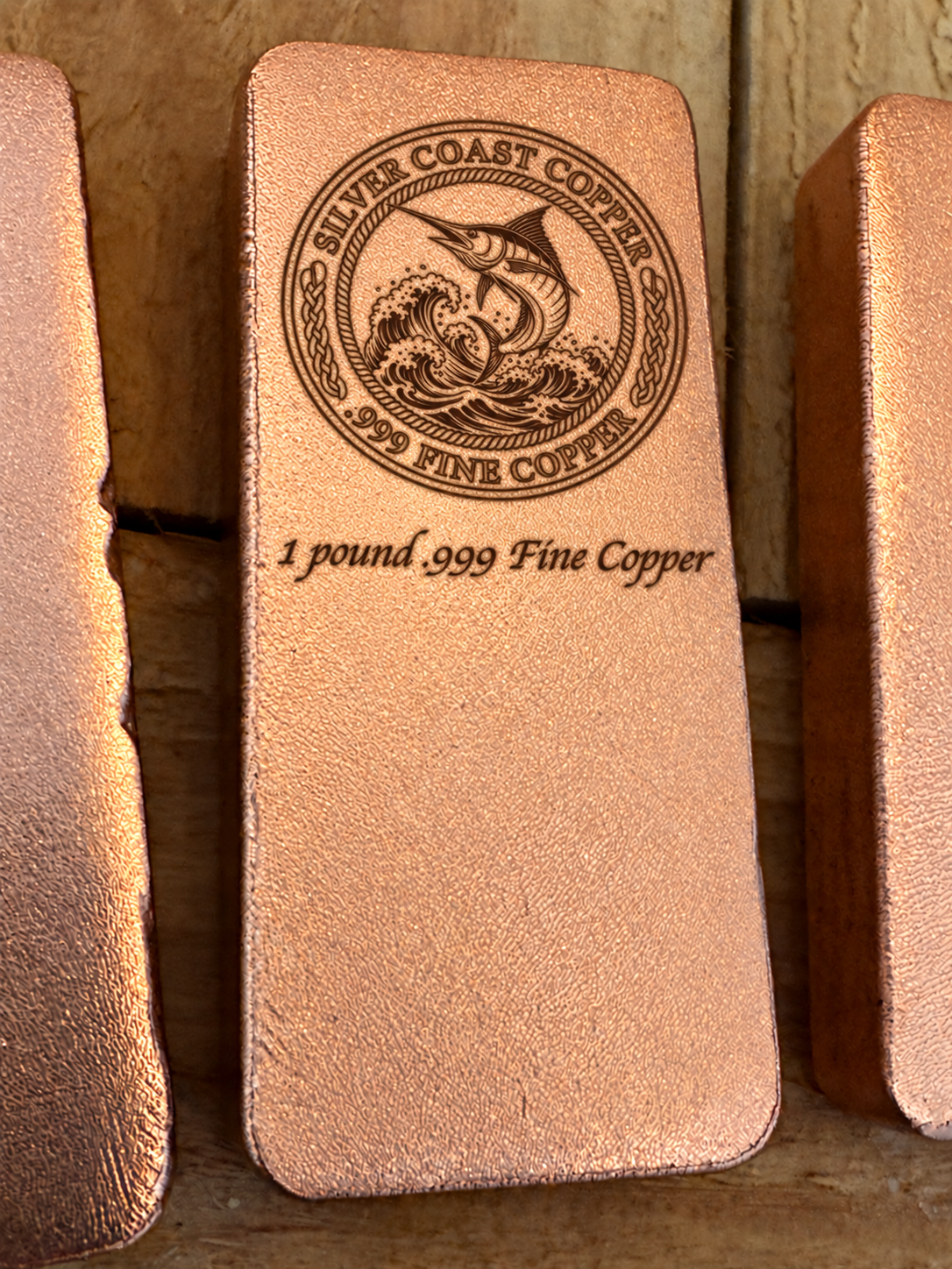 One pound .999 fine copper bar engraved with Silver Coast Copper Marlin logo, front view