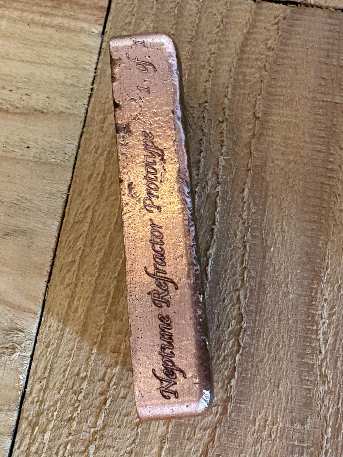 Neptune Refractor Prototype 1 pound copper bar edge engraving